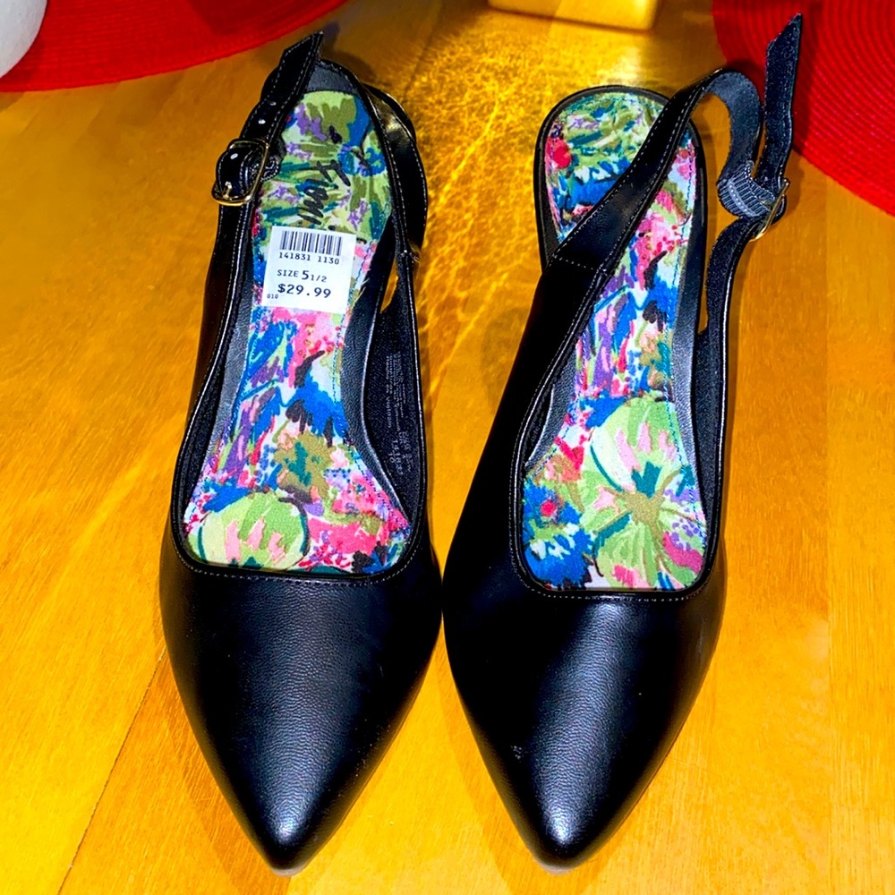 Worn once: Sexy black slingback pumps.